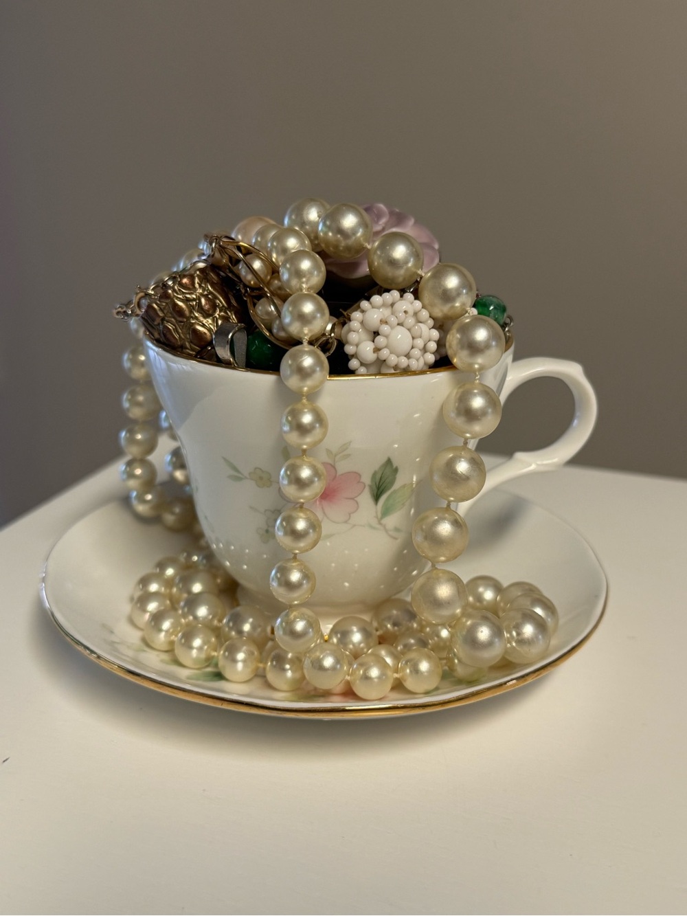 Mystery China tea cup filled with fabulous jewelry finds